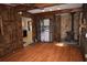 Living room with wood flooring and wood burning stove at 432 2Nd Ne Ave, Largo, FL 33770