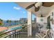 Relaxing balcony overlooking pool and water at 9815 Harrell Ave # 301, Treasure Island, FL 33706