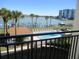 Relaxing pool area with scenic water views at 9815 Harrell Ave # 301, Treasure Island, FL 33706