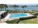 Inviting community pool overlooking a peaceful waterway at 9815 Harrell Ave # 301, Treasure Island, FL 33706