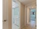 Hallway with access to bathroom and other rooms at 12000 Capri S Cir # 16, Treasure Island, FL 33706