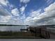 Community dock with lake access and rules posted at 18843 Ulmus St, Lutz, FL 33558