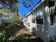 House exterior side view, light beige siding at 2925 Clinton S St, Gulfport, FL 33707