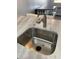 Modern kitchen sink with brushed nickel faucet at 2925 Clinton S St, Gulfport, FL 33707