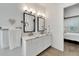 Elegant bathroom with double vanity and modern fixtures at 5316 Loon Nest Ct, Apollo Beach, FL 33572