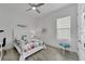 Bedroom with a queen bed, ceiling fan, and window coverings at 5316 Loon Nest Ct, Apollo Beach, FL 33572