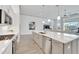 Open kitchen showcasing a large island and breakfast bar at 5316 Loon Nest Ct, Apollo Beach, FL 33572