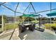 Covered patio with seating and a view of the water at 5316 Loon Nest Ct, Apollo Beach, FL 33572