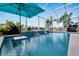 Stunning pool with a view and umbrella at 5316 Loon Nest Ct, Apollo Beach, FL 33572