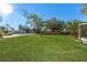 Large backyard with lush lawn and mature trees at 5100 3Rd S Ave, St Petersburg, FL 33707