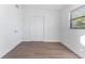 Bright bedroom with laminate flooring and double door closet at 5100 3Rd S Ave, St Petersburg, FL 33707