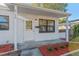 Renovated front porch with new door and windows at 5100 3Rd S Ave, St Petersburg, FL 33707