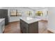 Kitchen island with white quartz countertop at 5100 3Rd S Ave, St Petersburg, FL 33707