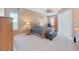 Comfortable main bedroom with a ceiling fan, neutral walls, and carpet floors at 11213 Warm Wind Way, Weeki Wachee, FL 34613