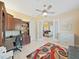 Home office features custom built-ins and decorative doors leading to the living room at 11213 Warm Wind Way, Weeki Wachee, FL 34613