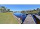 Wooden dock with access to the water at 5407 Tybee Island Dr, Apollo Beach, FL 33572