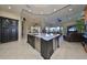 Large kitchen island with quartz countertop and stainless steel appliances at 5407 Tybee Island Dr, Apollo Beach, FL 33572