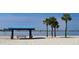 Gulfport Beach featuring a picnic shelter and palm trees overlooking calm water at 6075 Shore S Blvd # 306, Gulfport, FL 33707