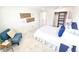 Comfortable bedroom with waterfront decor at 6075 Shore S Blvd # 306, Gulfport, FL 33707