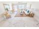 Spacious living room featuring marble floors, comfortable seating, and lots of light at 6075 Shore S Blvd # 306, Gulfport, FL 33707