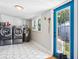 Convenient laundry room with washer, dryer, and backyard access at 3508 N Dartmouth Ave, Tampa, FL 33603