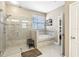 Bathroom with walk-in shower and separate bathtub at 11544 Lake Lucaya Dr, Riverview, FL 33579