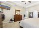 Large bedroom with mounted TV and ample closet space at 11544 Lake Lucaya Dr, Riverview, FL 33579