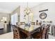 Bright dining room with a large table and chandelier at 11544 Lake Lucaya Dr, Riverview, FL 33579