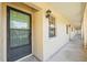 Covered walkway of a condo building with light fixtures at 2465 Northside Dr # 205, Clearwater, FL 33761