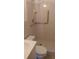 Bathroom with shower and grab bars at 5593 40Th N Ave # 319, St Petersburg, FL 33709