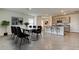 Elegant dining area with marble table and black chairs at 8333 Hardy Bay Loop, Wesley Chapel, FL 33545