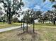 Outdoor exercise station with pull-up bar and bench at 8333 Hardy Bay Loop, Wesley Chapel, FL 33545