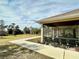 Spacious screened porch overlooking a verdant backyard at 8333 Hardy Bay Loop, Wesley Chapel, FL 33545