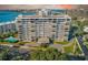 Aerial view of waterfront building with pool and parking at 30 Turner St # 201, Clearwater, FL 33756