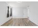 Bright bedroom with wood-look floors, a ceiling light, and natural light from the window at 3637 63Rd N St, St Petersburg, FL 33710