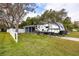 Home exterior with RV and fenced yard at 4026 Arkansas Ne Ave, St Petersburg, FL 33703