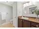 Bathroom boasts granite vanity and tiled floors at 501 Knights Run Ave # 1217, Tampa, FL 33602