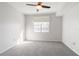 Well-lit bedroom, ceiling fan, and neutral wall colors at 501 Knights Run Ave # 1217, Tampa, FL 33602