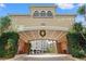 Inviting building entrance with covered parking and lush landscaping at 501 Knights Run Ave # 1217, Tampa, FL 33602