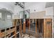 Bathroom under renovation, showing exposed plumbing and framing at 635 Hudson Ave, Tampa, FL 33606