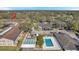 Complex view showing building, pool, and shuffleboard at 11200 102Nd N Ave # 66, Seminole, FL 33778