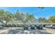 Charming condo building featuring a well-maintained façade and ample parking under the shade of mature trees at 11200 102Nd N Ave # 66, Seminole, FL 33778