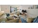 Well-decorated living space with a large window, comfortable seating, and a relaxing atmosphere at 11200 102Nd N Ave # 66, Seminole, FL 33778