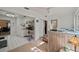 Open floor plan showcases a living area adjacent to the kitchen with neutral tones at 11200 102Nd N Ave # 66, Seminole, FL 33778