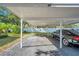 Convenient covered parking spot with a well-maintained asphalt surface, perfect for keeping your vehicle protected at 11200 102Nd N Ave # 66, Seminole, FL 33778
