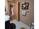 Bright bathroom with access to another room at 855 Pinewood W Ter, Palm Harbor, FL 34683