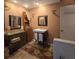 Updated bathroom with a pedestal sink and tiled floor at 855 Pinewood W Ter, Palm Harbor, FL 34683