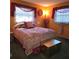 Spacious bedroom with a double bed and window views at 855 Pinewood W Ter, Palm Harbor, FL 34683