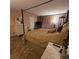Cozy bedroom with a comfortable bed and dresser, lots of natural light at 855 Pinewood W Ter, Palm Harbor, FL 34683