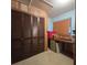 Storage or workroom with closet and work area at 855 Pinewood W Ter, Palm Harbor, FL 34683